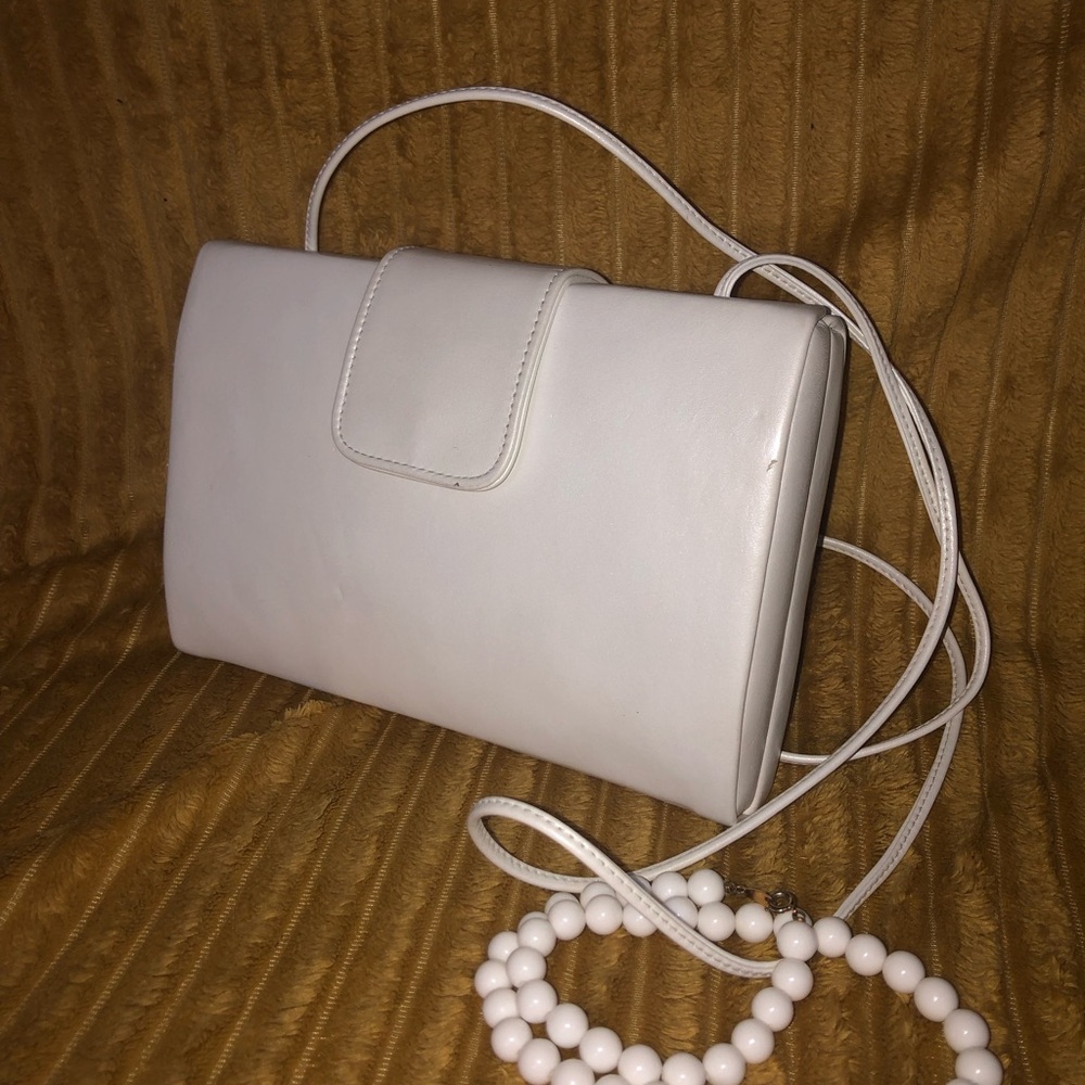 White Structured Clutch with Flap Closure and Adjustable Strap